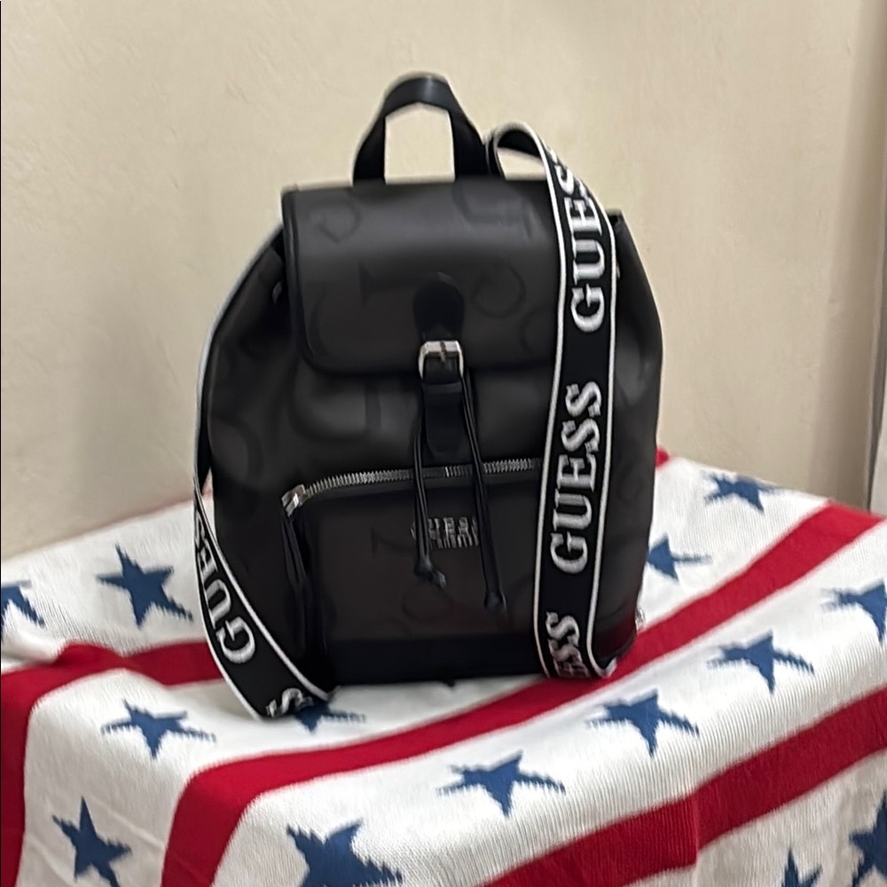 Guess Black Backpack with Striped Strap and Flap Closure